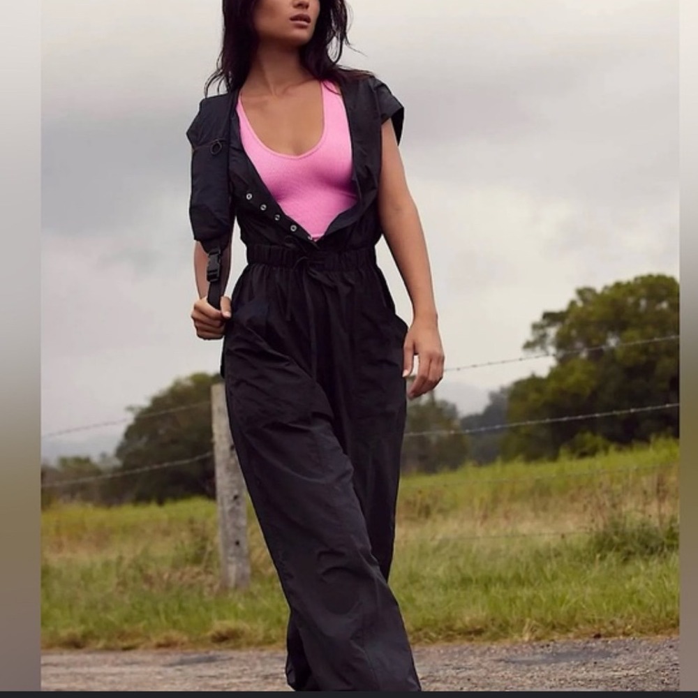 Free People FP Movement Fly By‎ Night Jumpsuit Sz S Wide Leg Black Pocket NEW